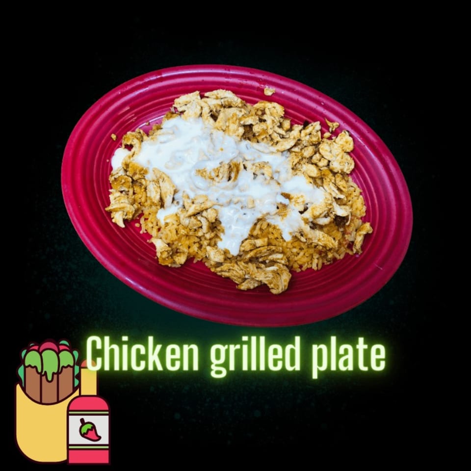 Don Tequila Amherst's chicken grilled plate with rice and white sauce on a red plate.